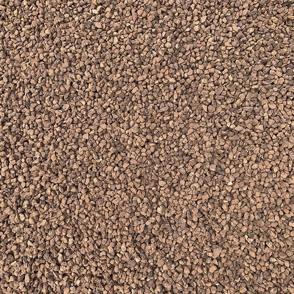 pea gravel is an excellent choice for flower beds and garden pathways as it allows water to drain while keeping the soil in place